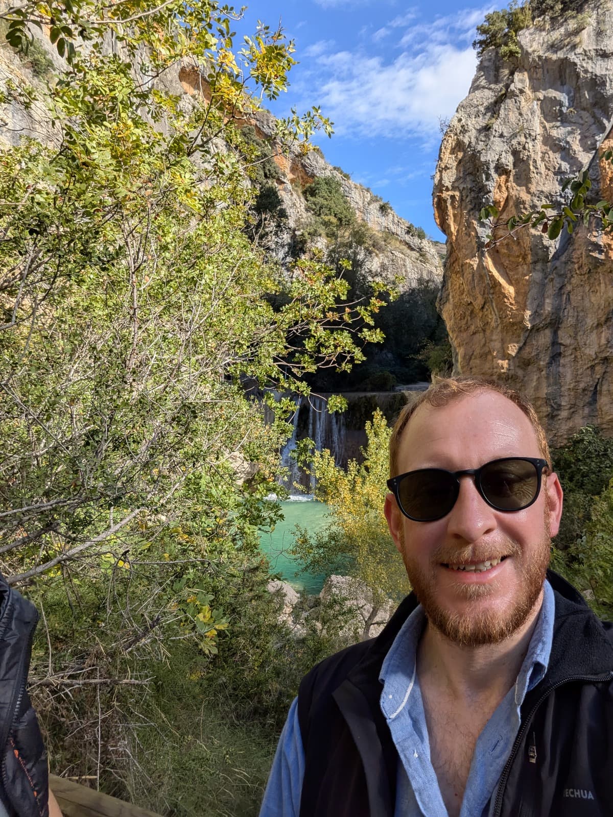 Simon at a tasting pouring sauce