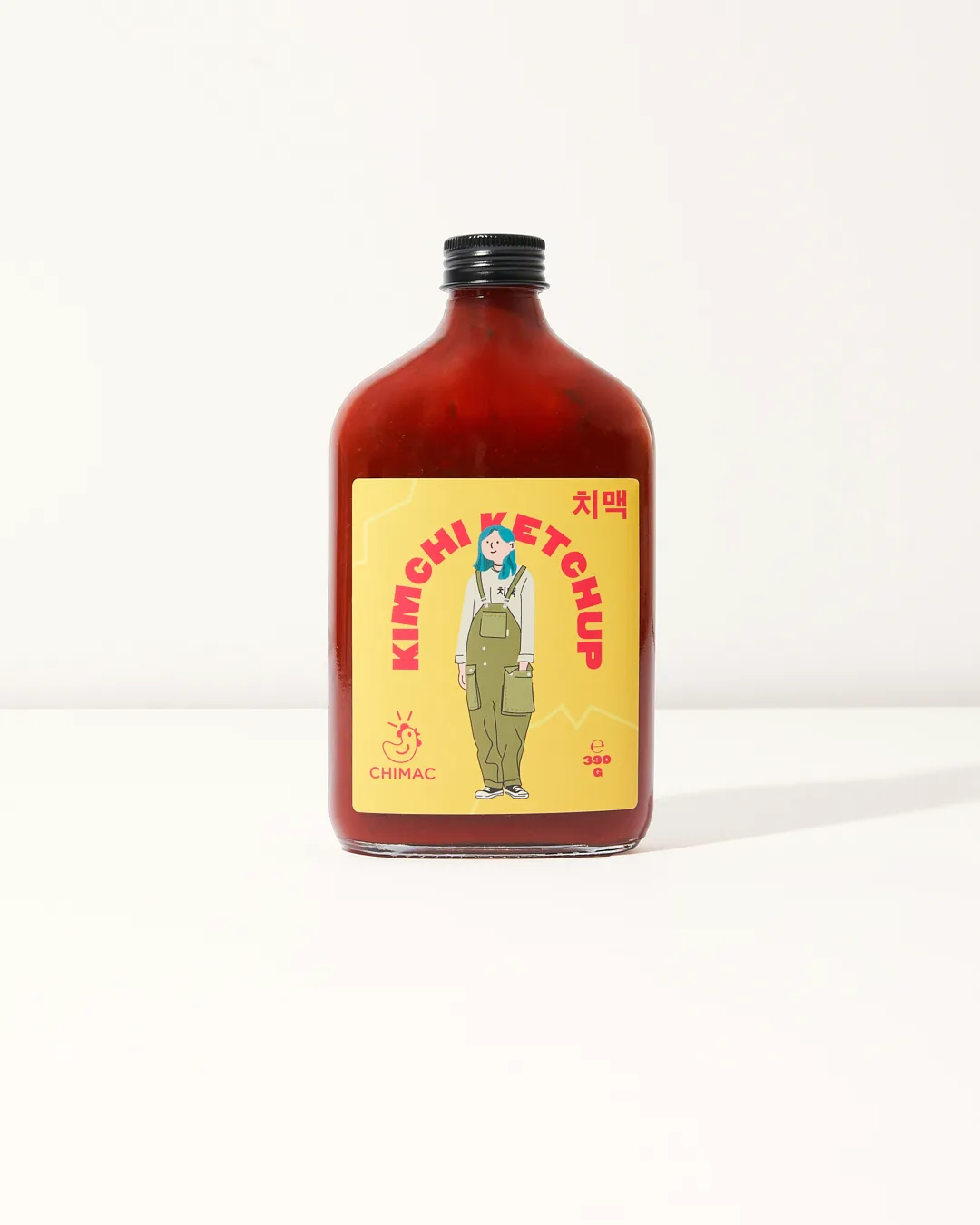 Chimac Kimchi Ketchup hot sauce bottle - Chimac's inspired sauce blends classic ketchup with a spring onion kimchi kick. Perfect for adding a funky twist to fries, burgers and all the rest. Give the bottom a good smack and go WILD!